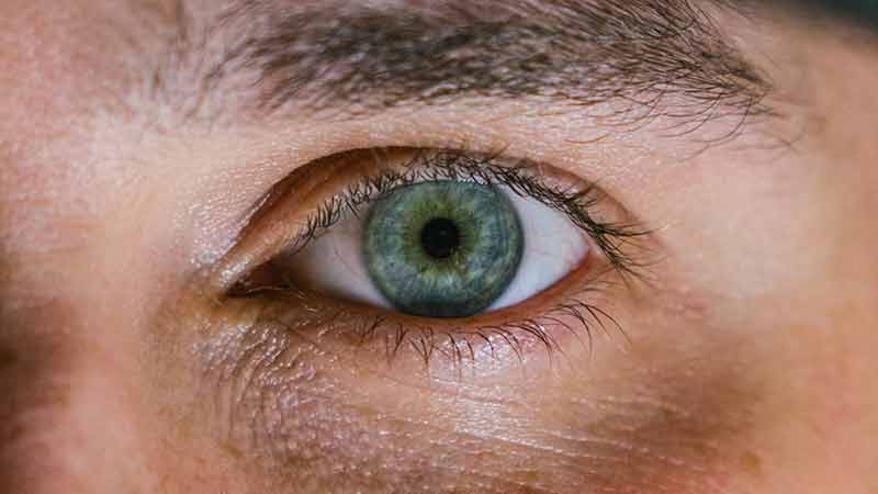 A person with a blue eye