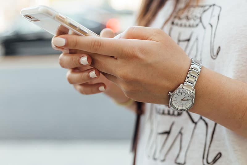 A person holding a smart phone