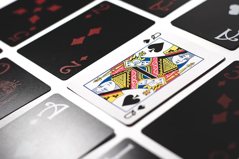 The queen of spades playing card