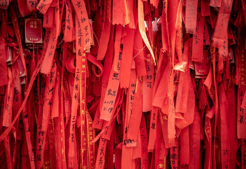 Strips of red cloth hanging